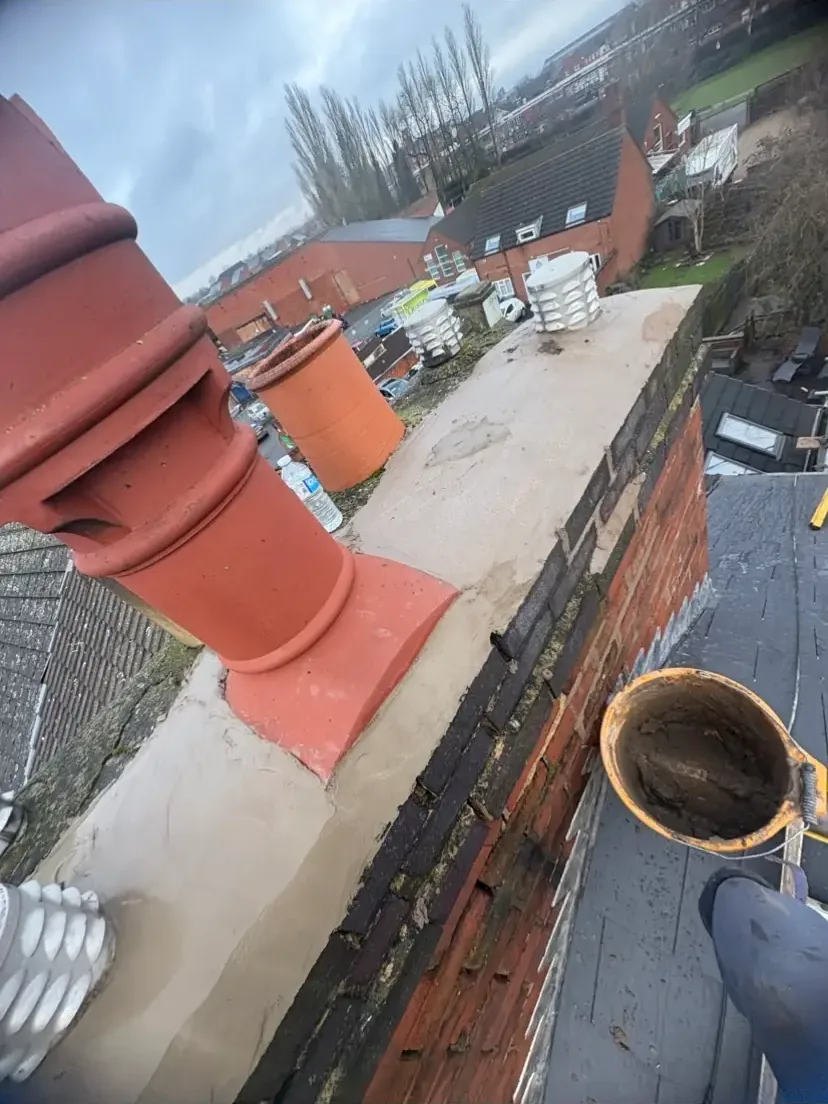 Re-bed ridge tiles, Leicester